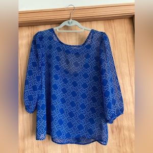 Geometric shapes blue blouse with open back small made in USA